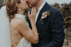 a wedding portrait of chloe and adam at newstead vineyards