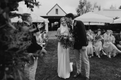 chloe and adam together at their newstead vineyards wedding