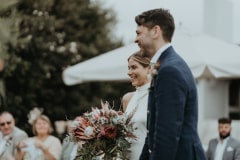 chloe and adam together during their newstead vineyards wedding