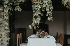 chloe and adam photographed together at newstead vineyards