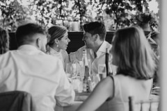 chloe and adam photographed together at their vineyard wedding