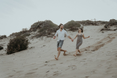 dusty and shannon during their engagement shoot at keurboomstrand