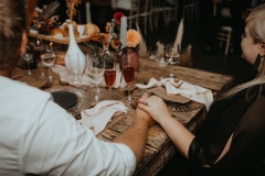 Adriaan beside Sharlize at their Kay and Monty wedding