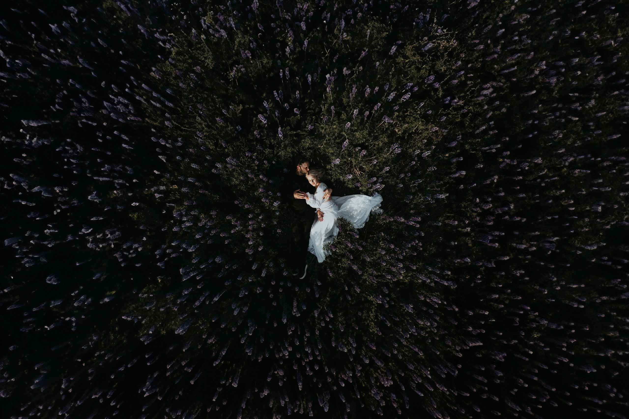 couple standing together during their iceland elopement in open terrain